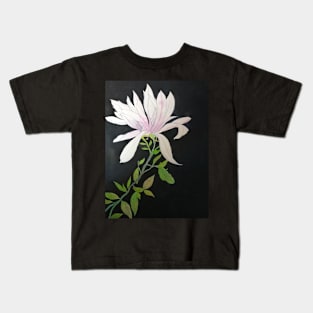 Pale pink magnolia against a dark background Kids T-Shirt